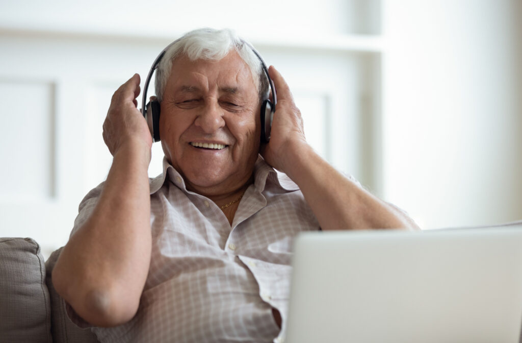Senior man wearing headphones.