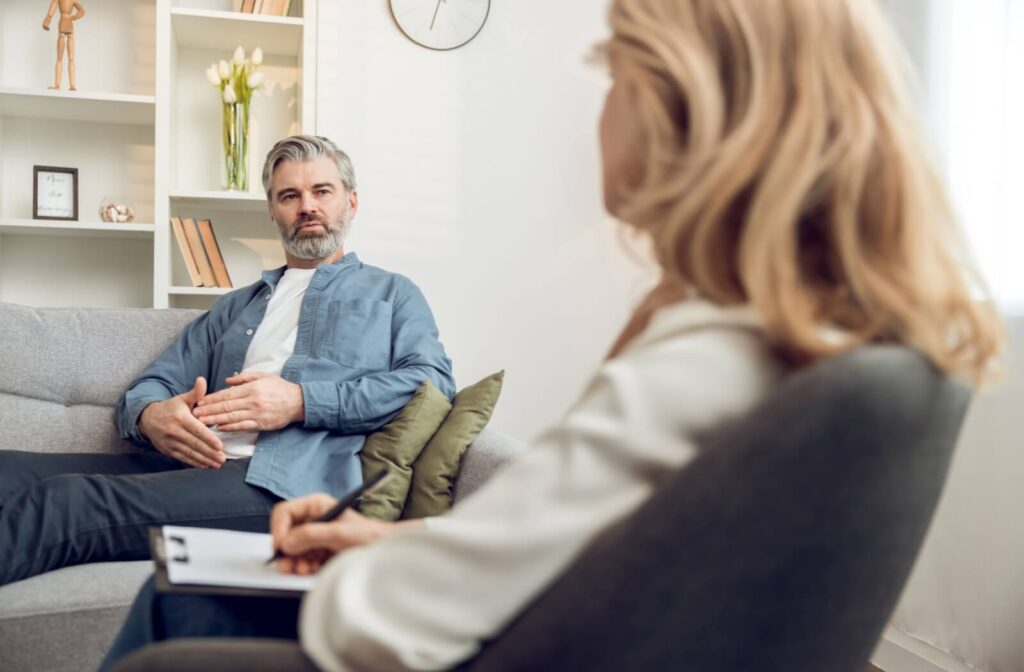 An older adult talks to a therapist to help process their feelings of aging and concerns about accepting help